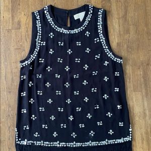 sleeveless black top with crystals